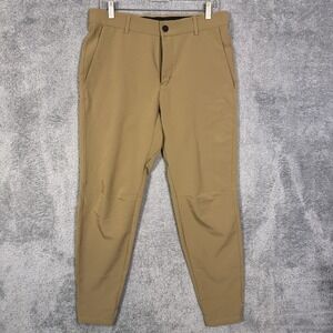 UNRL Concourse Golf Pants Mens M 33x30 Brown Stretch Softshell Tech Performance